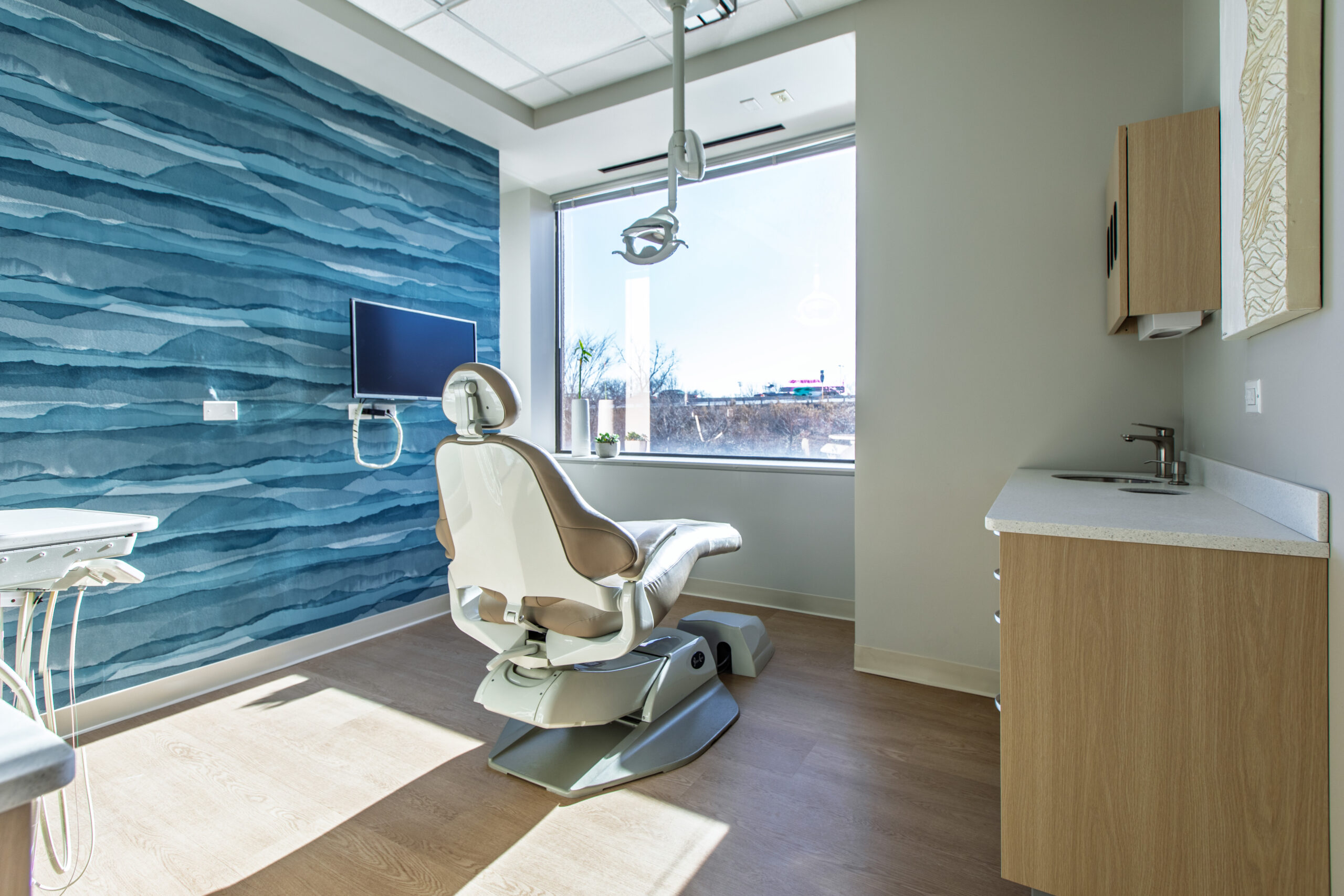 Dental chair in a treatment room at Crown Dental Club